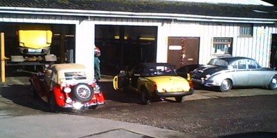 A group of classic cars await servicing at Manor Garage, Wantage